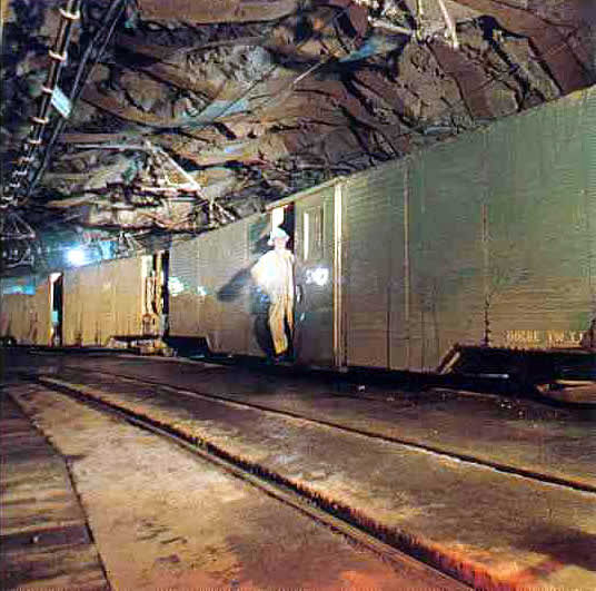 Train hauling men underground